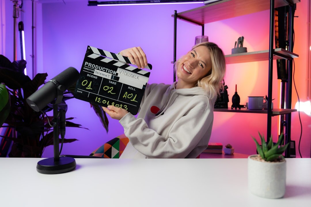 Woman show producer holding a tablet in a studio